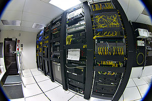 Racks of telecommunications equipment in part ...