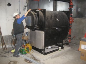 Emily Cross, Engineer at Cx Associates, performs commissioning in the field