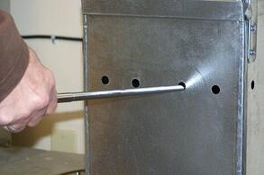 Photo of a Hot Wire Anemometer in an Airflow Traverse: Measurement Tools for Energy Audits and RCx